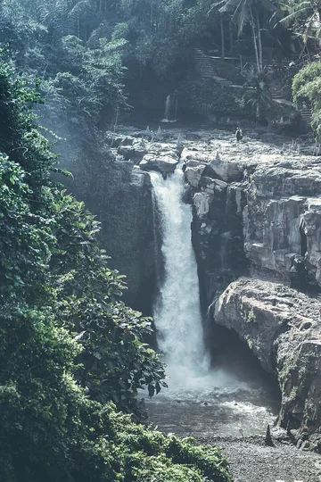 Tegenungan Waterfall on Bali island. Indonesia. Beautiful waterfall in the jungle.