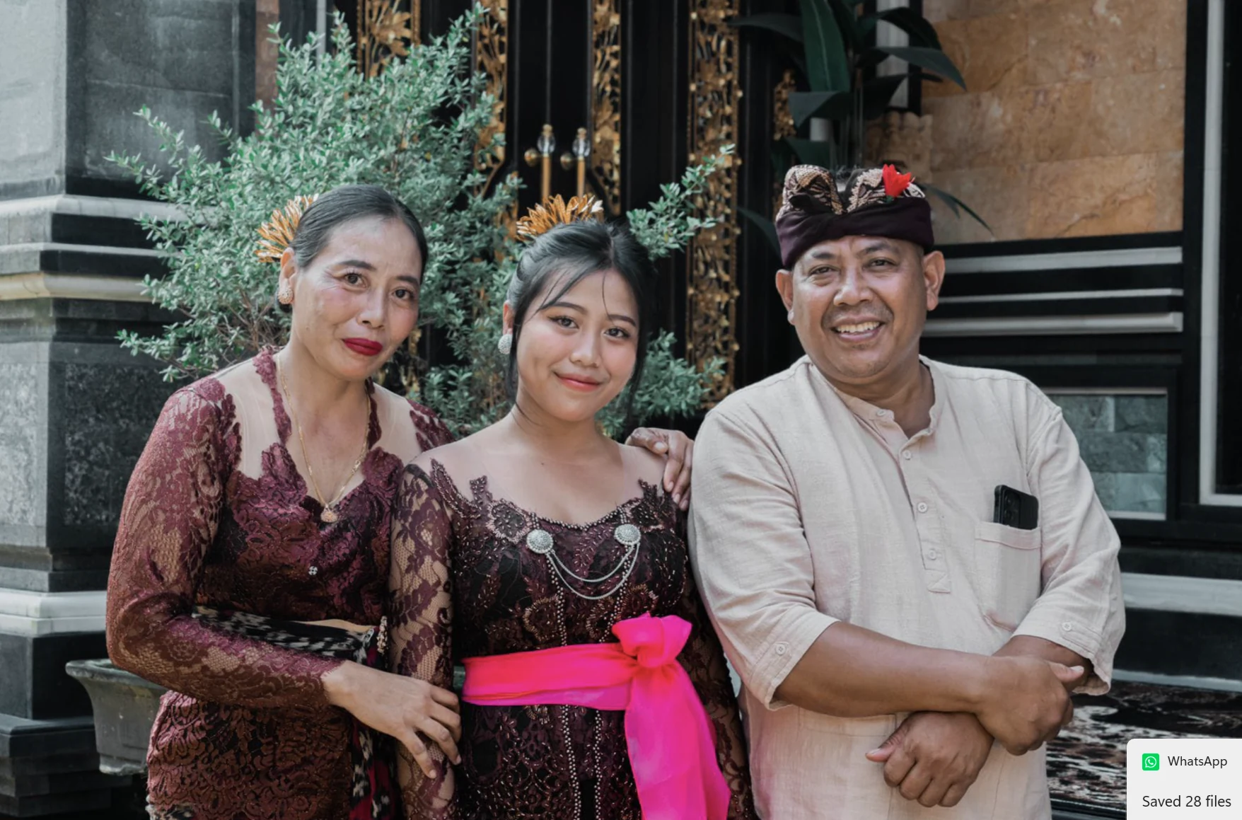 Dewa smiling, wearing a traditional headcloth and a light shirt
